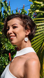 Boucle d'oreille fleur blanche
