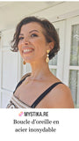 Boucle d'oreille coeur blanc